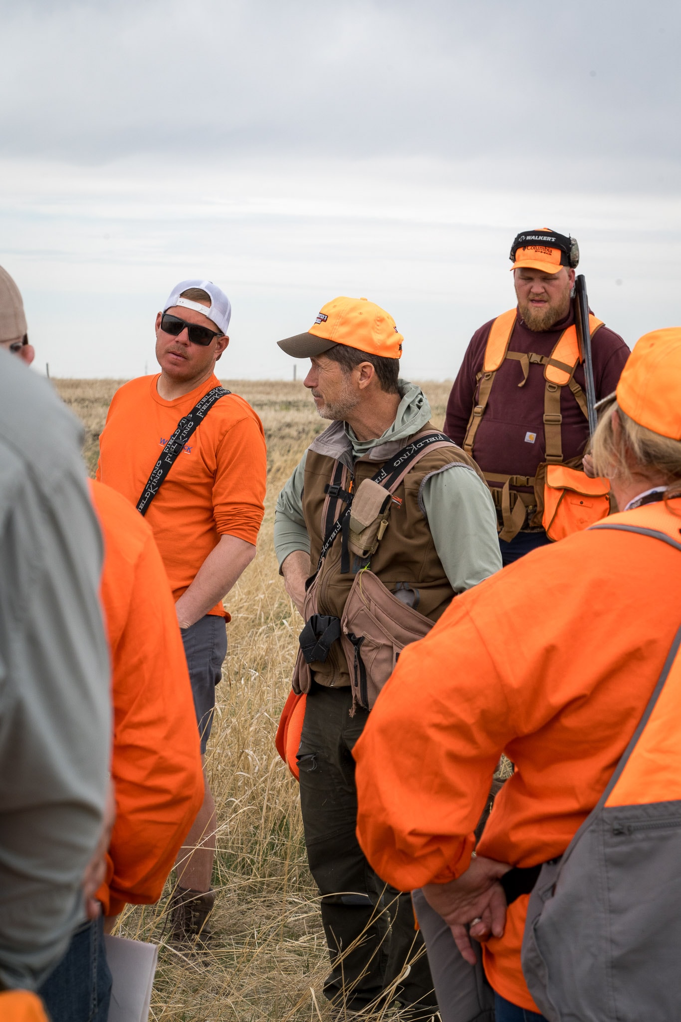NAVHDA field instruction with handlers in a prairie setting